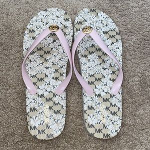 brand new Michael kors flip flops size 10